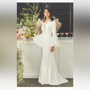 Elegant White Gown with Flared Sleeves